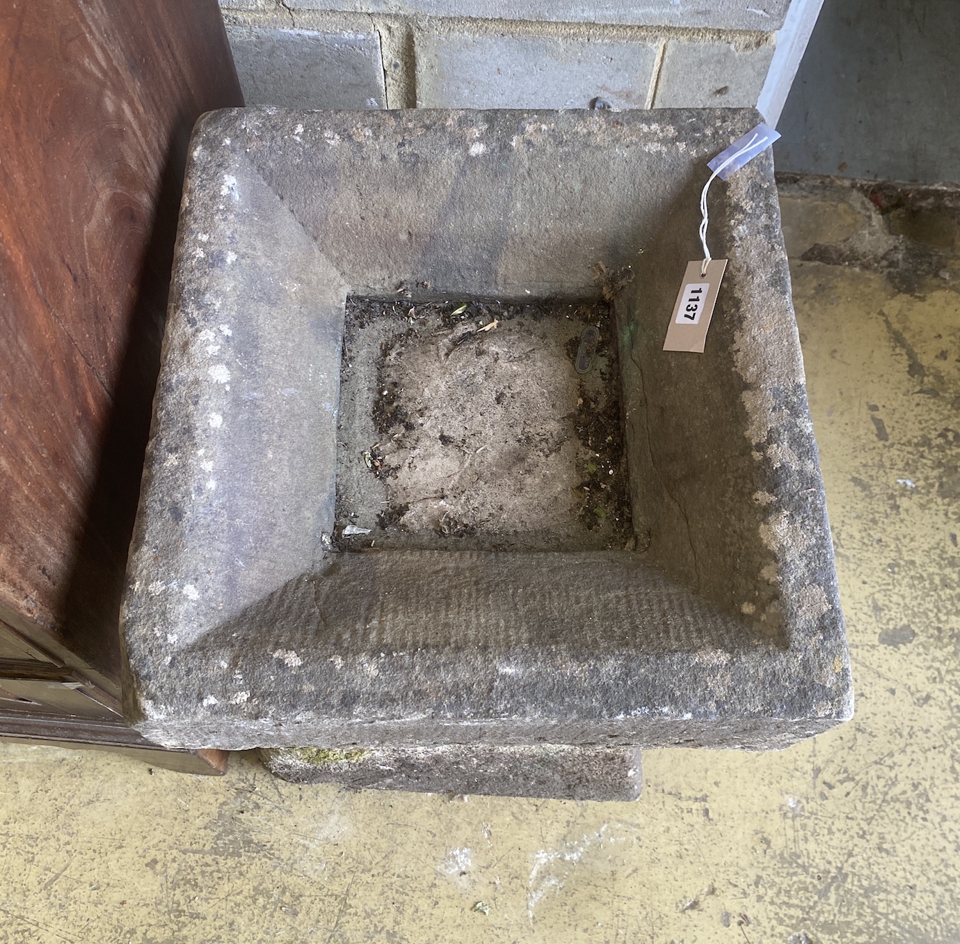 A 19th century staddle stone base with reconstituted bird bath top, width 44cm, depth 45cm, height 52cm